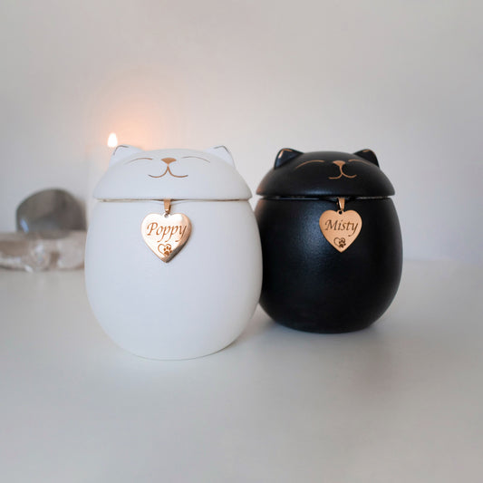 Personalised cat memorial urn, white or black engraved with name on gold heart