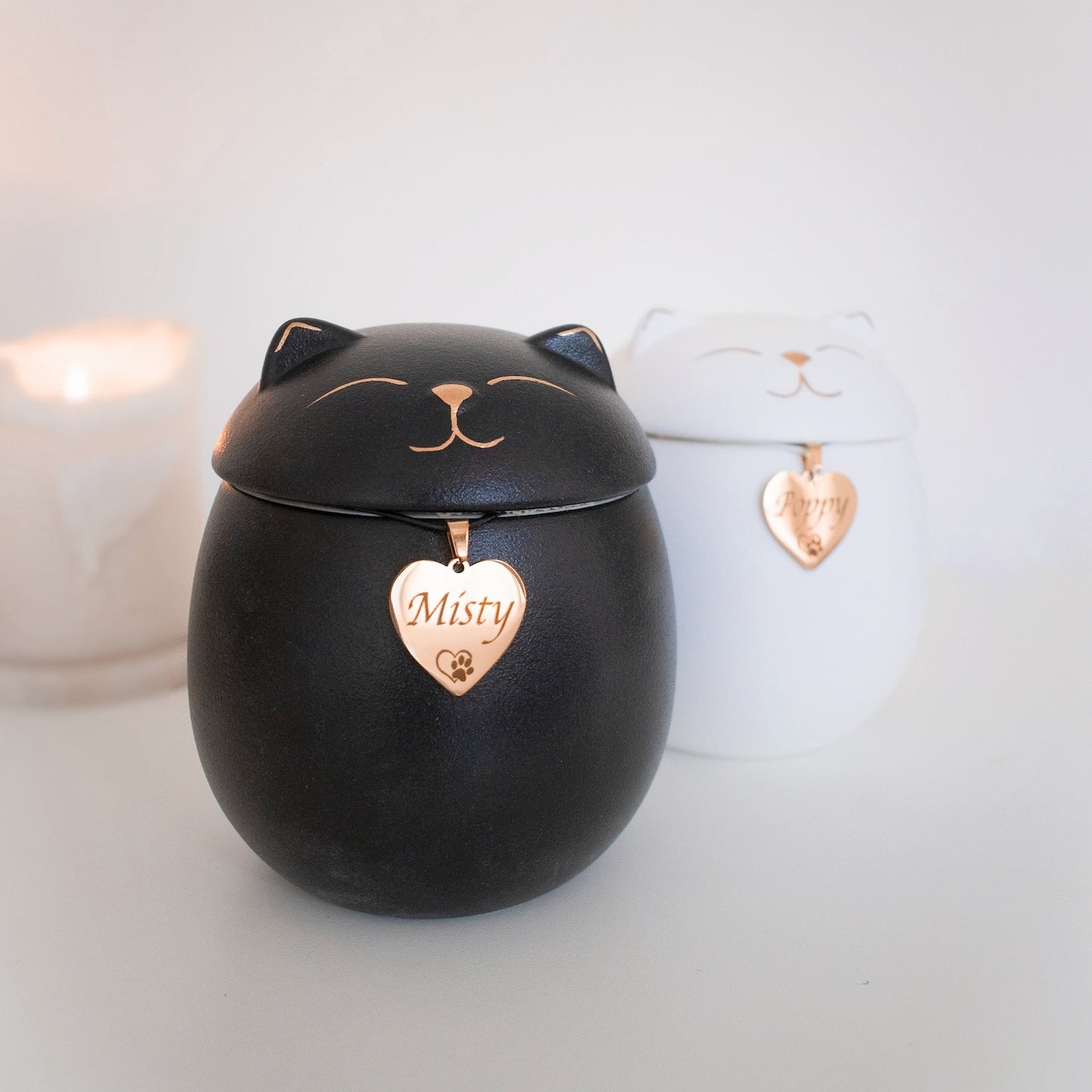 Personalised cat memorial urn, white or black engraved with name on gold heart